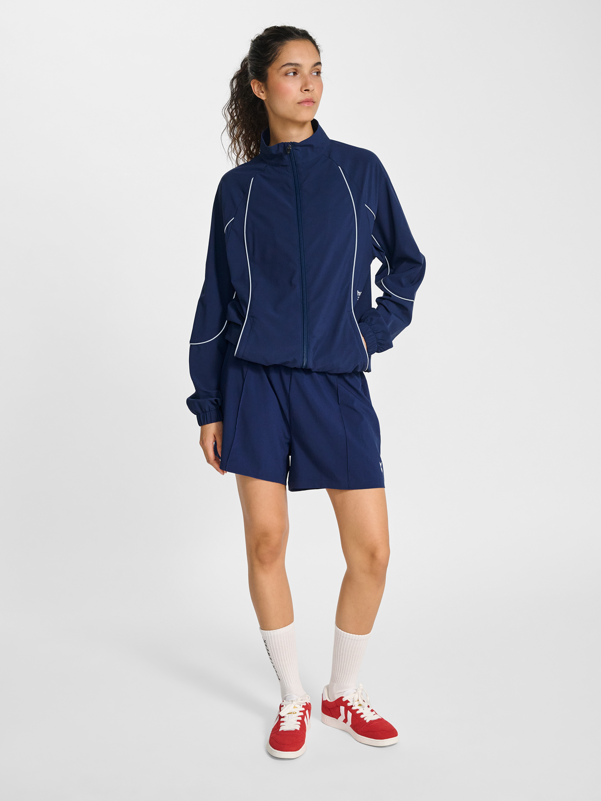 hmlPULSE WOVEN W ZIP THROUGH