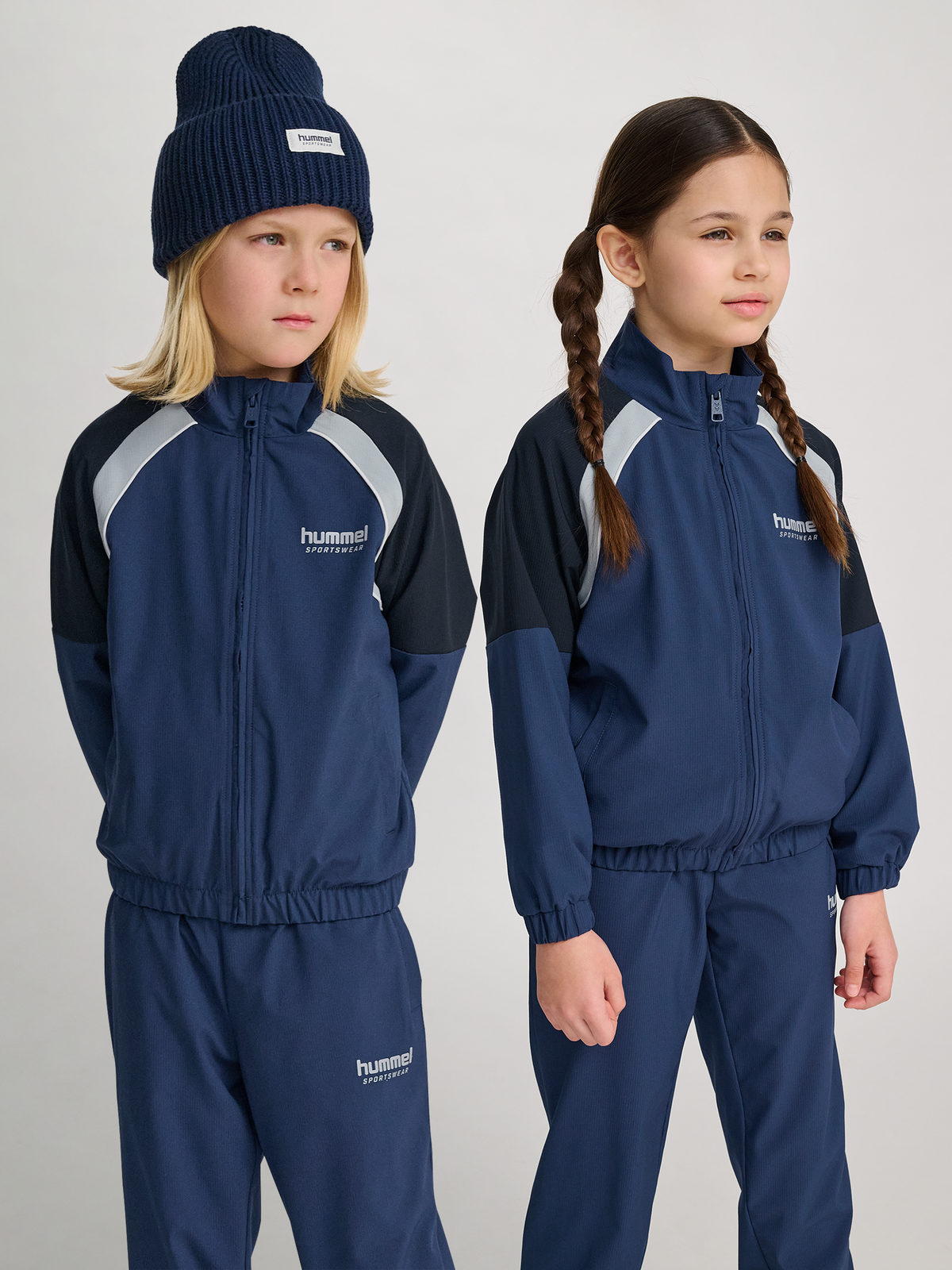 hmlJR LOOSE TRACKSUIT ZIP JACKET