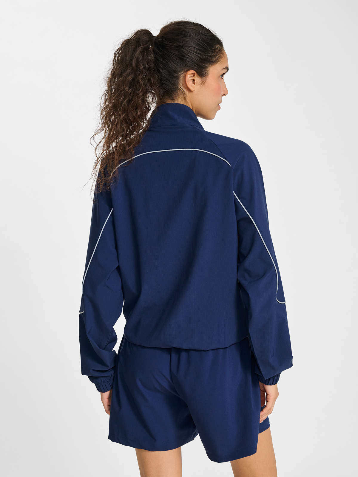 hmlPULSE WOVEN W ZIP THROUGH